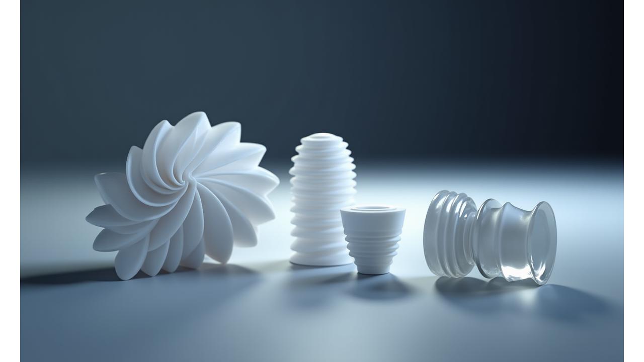 Gallery of intricately machined ceramic and glass components, showcasing micron-level details and various geometries